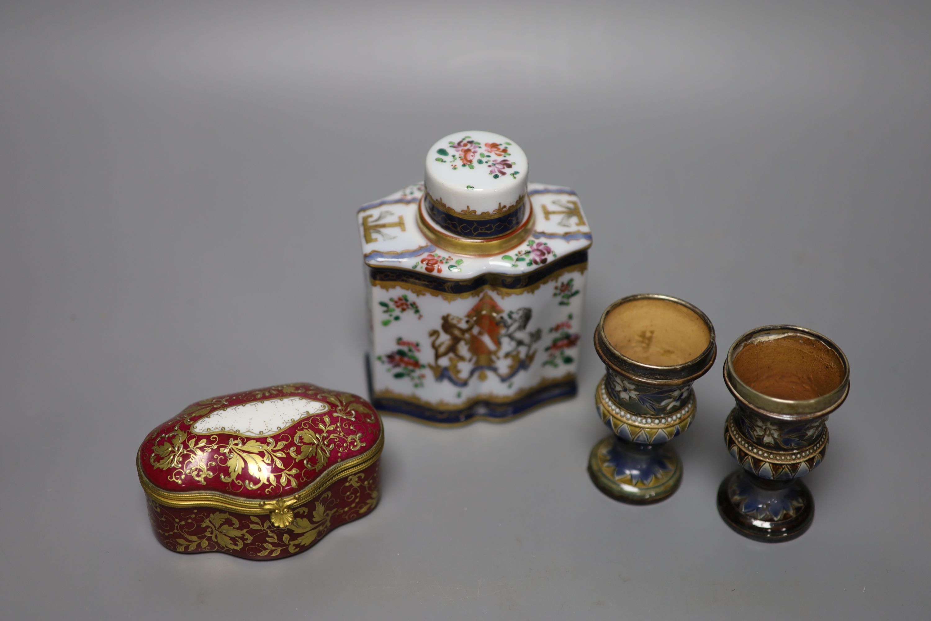 A Samson crested porcelain lidded tea caddy, height 13cm, together with a Limoges lidded porcelain casket,